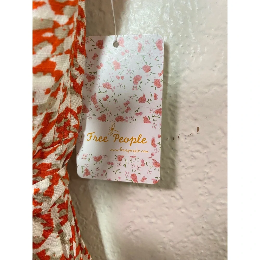 Free People French Quarter Orange Abstract Ruffle Wrap Mini Dress Medium NWT